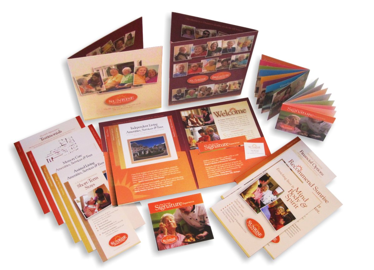 Overhead photo view of all print-on-demand sales collateral for Sunrise Senior Living composed in an array to exhibit the intentional graphic use of warm residential colors of burgundy, soft butter yellow, golden yellows, cinnamon and Sunrise signature orange which make for a neutral earth tone background palette so that landscaping, plants and clothing colors for seniors in jewel tones of periwinkle blue, spring green, pink and lilac create a full spectrum of joyful color to further enhance the visual spirit of the Joy of Every Day. 